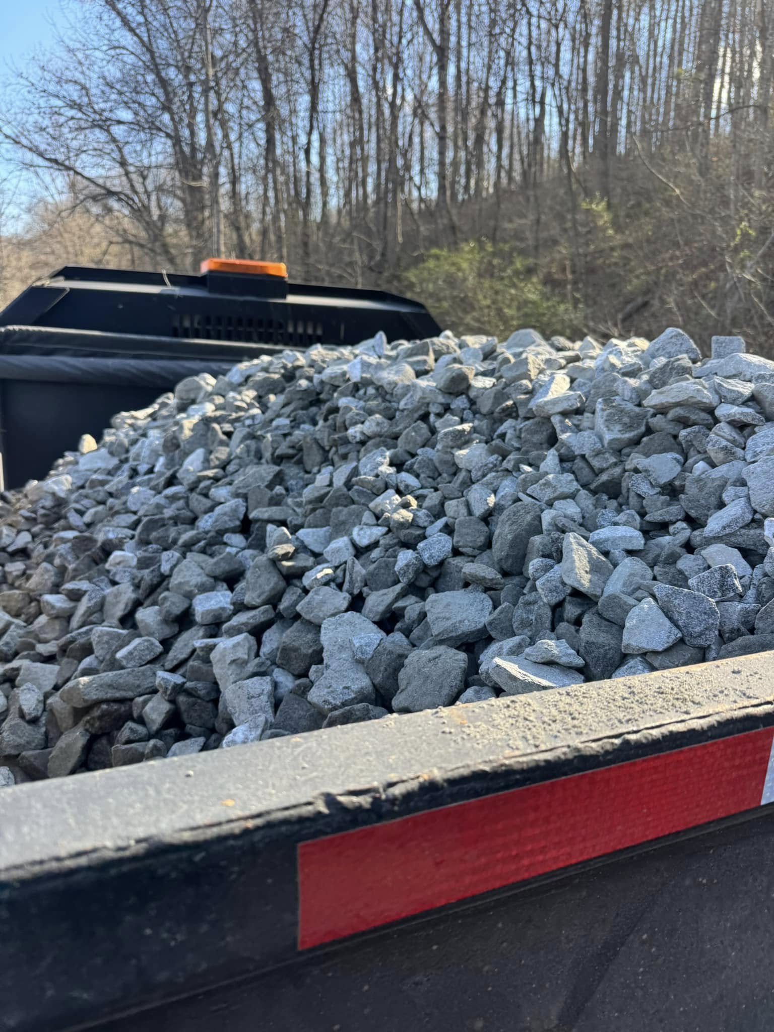 Professional gravel driveway installation in Sylva North Carolina with mountain backdrop